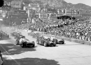 the_start_of_the_monaco_grand_prix_monte_carlo_22nd_may_1955._juan_manuel_fangio_and_stirling_moss_in_the_mercedes_w196_bracket_alberto_ascaris_lancia_d50_as_eugenio_castellottis_lancia_follows_closely